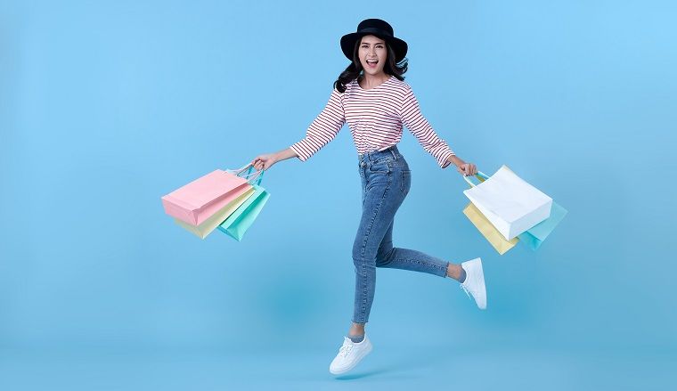 cheerful-happy-thai-asian-woman-enjoying-shopping